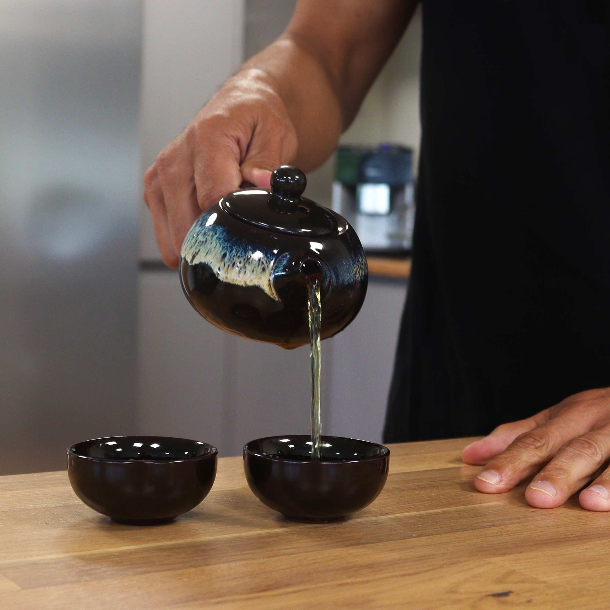Herbal Black Glaze Teapot Set With Two Cups